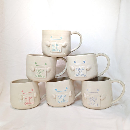 Hand-Thrown Ceramic Mug with "You Is Okay" Sign – Whimsical Face Mug