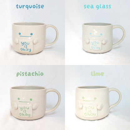 Hand-Thrown Ceramic Mug with "You Is Okay" Sign – Whimsical Face Mug